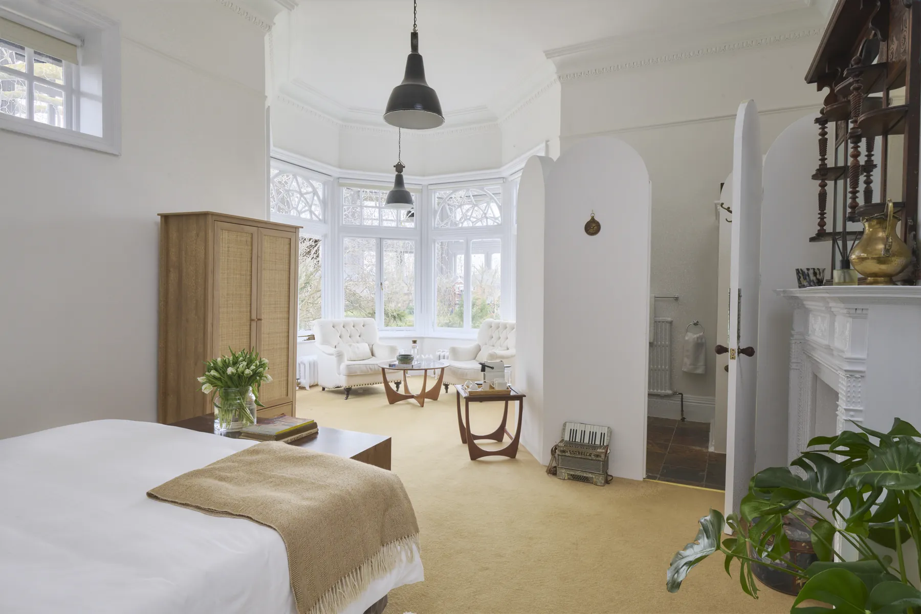 Brunel's Arch, a corner room with a king bed and a turreted bay window